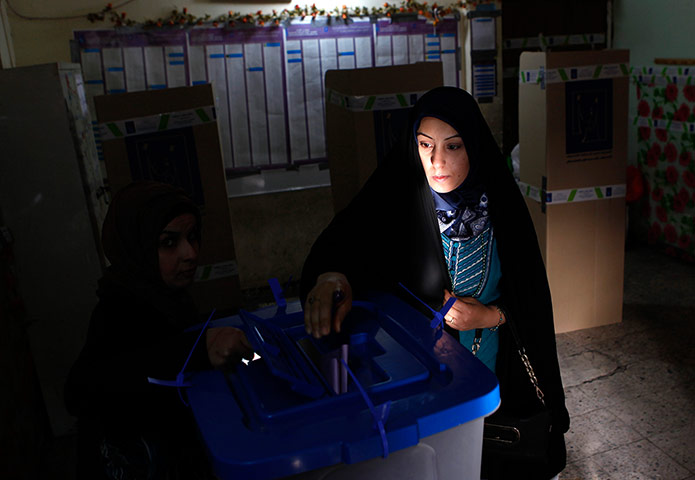 24 hours: An Iraqi woman, the last voter in a polling center in the Karrada neighborh