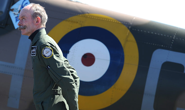 24 hours: Serving RAF pilot Charlie Brown stands by a Spitfire BM597, during the 'Fly