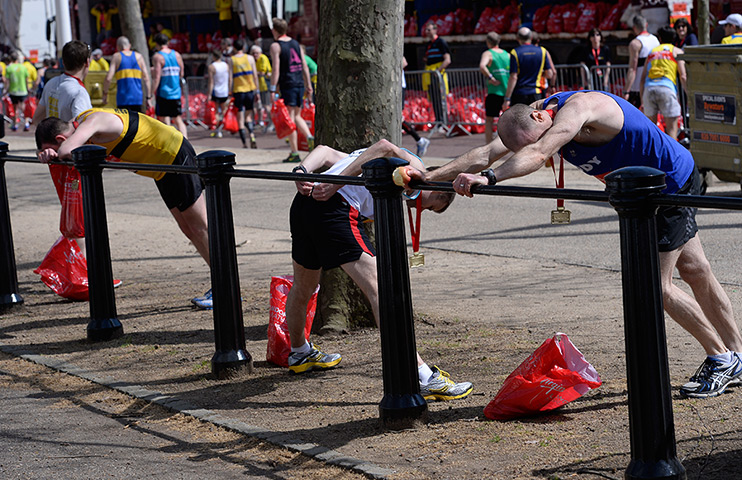 London Marathon: Exhausted finishers on The Mall 