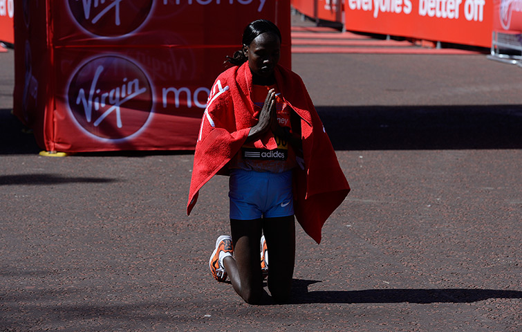 London Marathon: Kenya's Priscah Jeptoo, the winner of the womens race prays just after cros