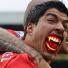 Suárez bite memes: Suarez fangs