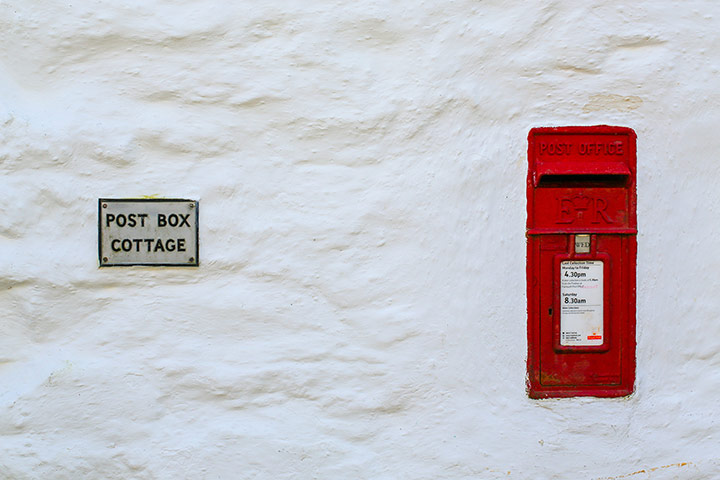 your pictures - post : red postbox within white textured wall