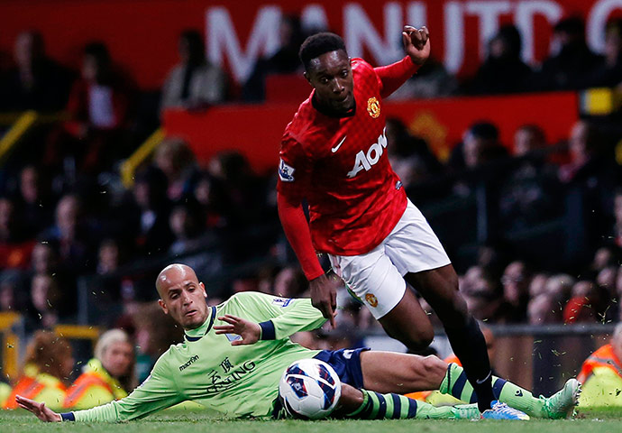 United v Villa 2: Danny Welbeck skips past the challenge of Aston Villa's Karim El Ahmadi