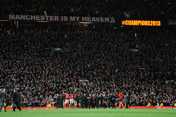 United v Villa 2: Manchester United fans and players celebrate