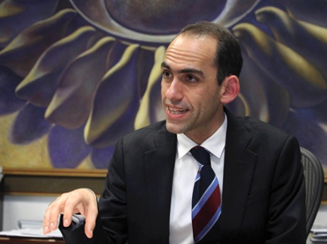 Cypriot Finance Minister Harris Georgiades speaks to Reuters in an interview in Nicosia April 22, 2013.