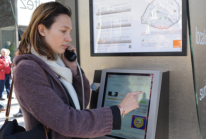 Smart Cities Gallery 1: Smart Cities: A woman gives a phone call at a new gene