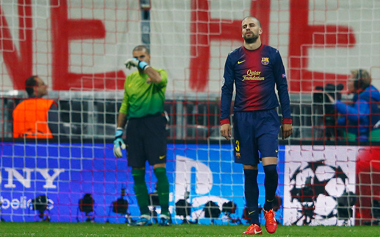 Bayern versus Barca: Barcelona's Gerard Pique and goalkeeper Victor Valdes react 