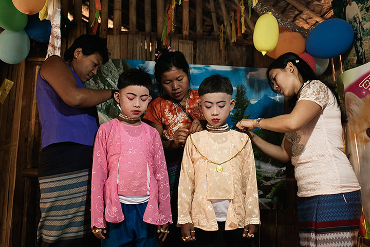 Theravada initiation: Saw Win Gy and The The Win get dressed form their mother. Gold and jewelry 