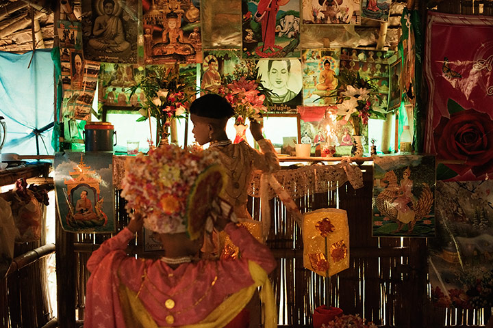 Theravada initiation: visiting Buddhist shrine at friend's home