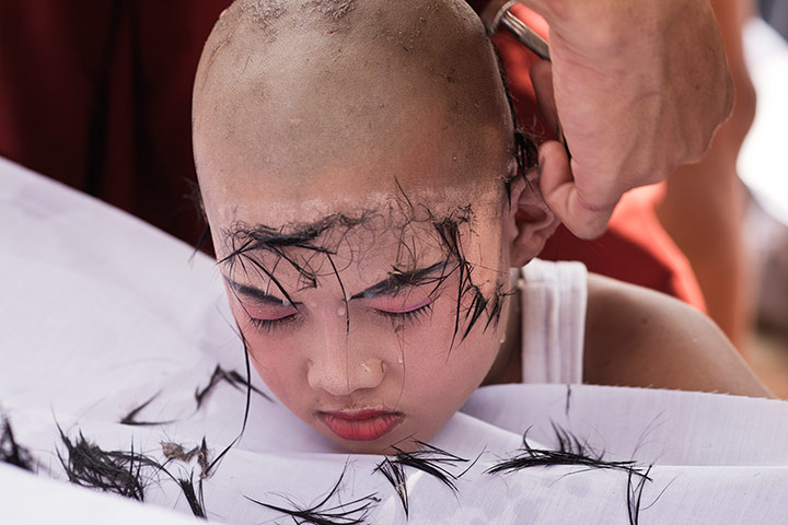 Theravada initiation: Saw Win Gy head shaved