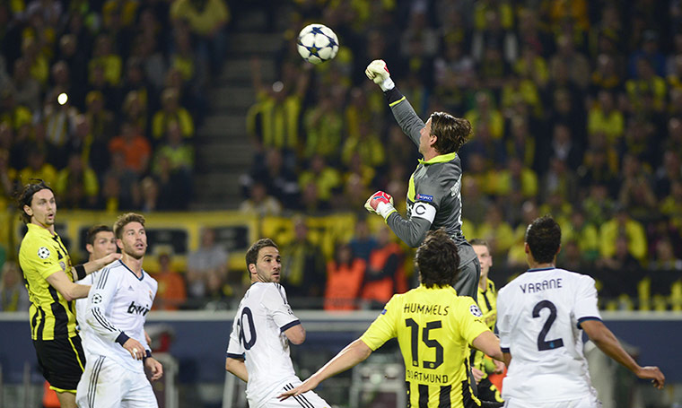 Dort v Real: Dortmund's goalkeeper Roman Weidenfeller punches the ball away