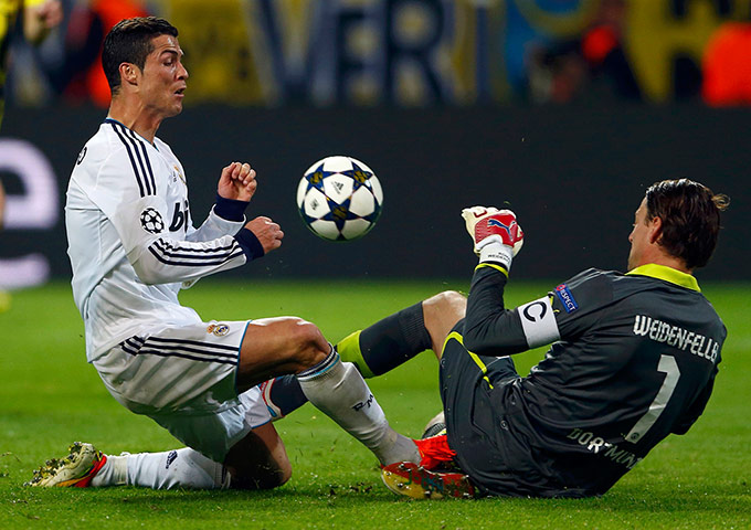 Dortmund v Real 2: Real Madrid's Ronaldo and Borussia Dortmund's goalkeeper Weidenfeller 