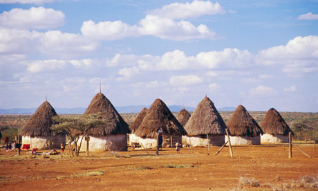 Clouds Over Laikipia Masai Rondavels