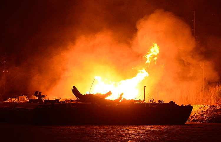 24 hours in pictures: Mobile Fuel Barge Explosions