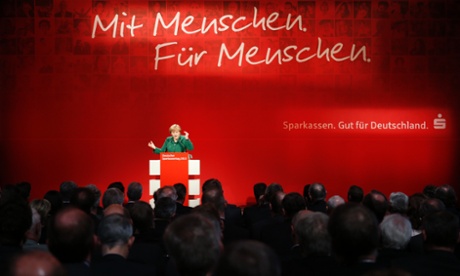 Chancellor Angela Merkel at a savings bank conference. Photograph: Reuters/Fabrizio Bensch
