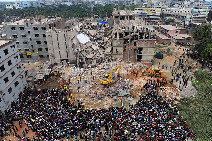 24 hours: Dhaka, Bangladesh: Volunteers and rescue workers at the scene