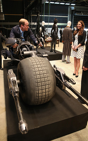 Royal Warner Bros: Catherine, Duchess of Cambridge watches as Prince William sits on the 'Batp