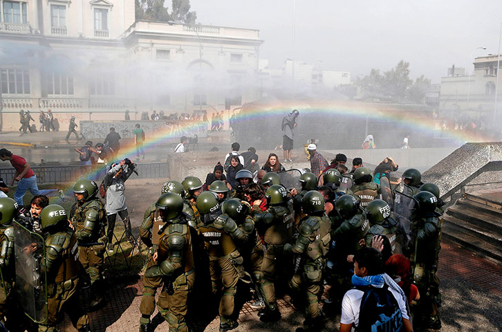 20 Photos: Student protesters during a clash demanding education reform, in Santiago