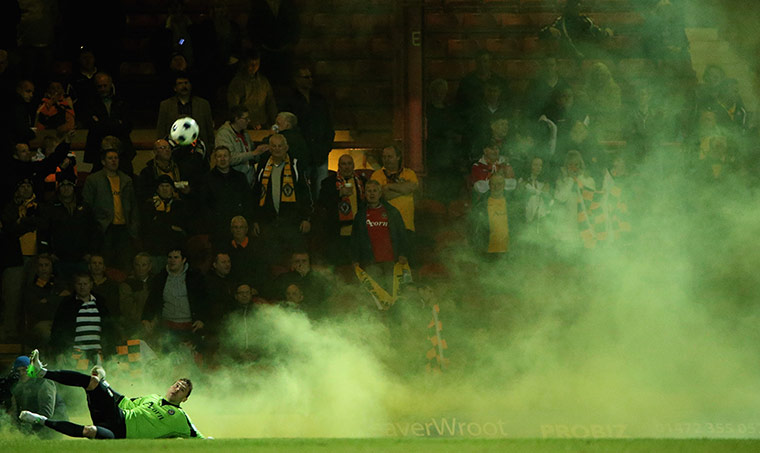 best of the week: Newport County's Lenny Pidgeley clears the ball