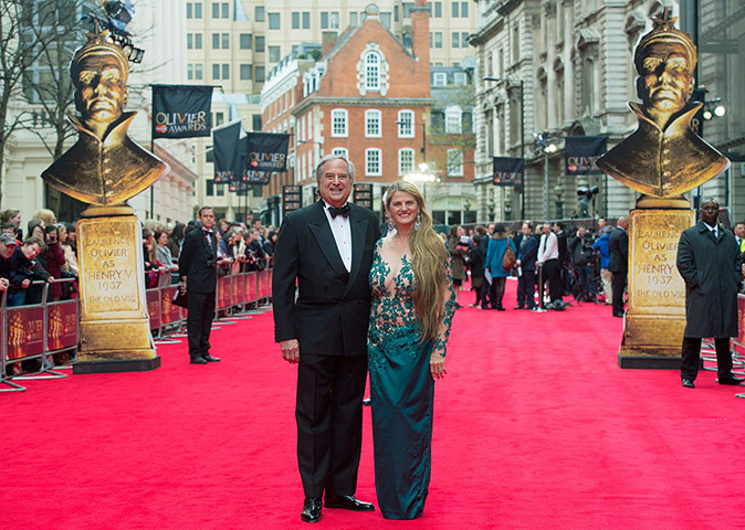 Laurence Olivier Awards: Top Hat producers Bonnie Comley (R) and Stewart F. Lane  walk the red carpe