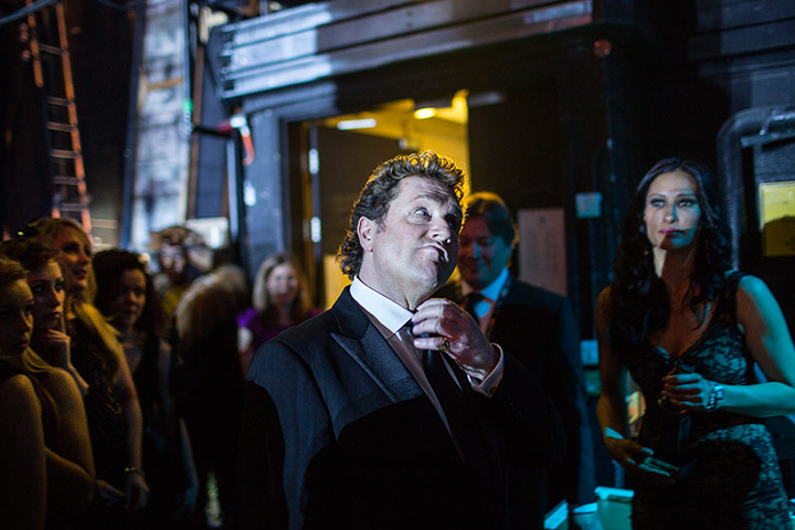 Laurence Olivier Awards: Michael Ball straightens his collar backstage at The Olivier Awards