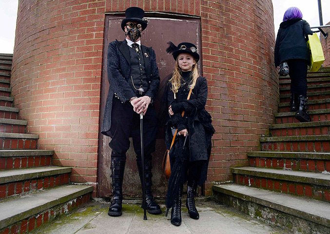 whitby goth festival: Heath Waller and his daughter Meagan, 10,  pose for photographs