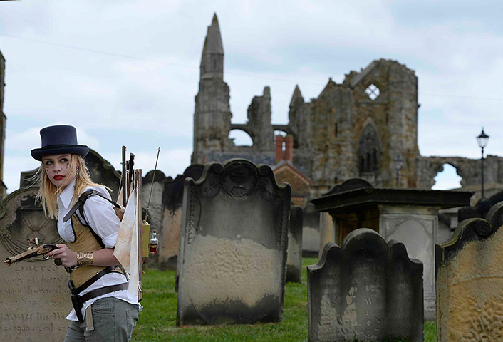 whitby goth festival: Goths roam the grounds of Whitby Abbey