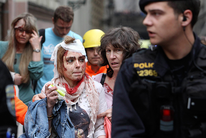Prague explosion: Injured people leave the area after an explosion