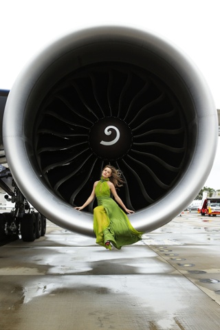 Georgia May Jagger poses inside an engine of a British Airways 777 airliner in Sydney, Australia. British Airways launched the new Boeing 777-300ER aircraft on the London-Sydney route with a special on-board celebration. Guests enjoyed a British traditional high tea from the Langham Hotel, Sydney. Georgia May Jagger led a fashion show with models showcasing the PPQ Autumn/Winter 2013 collection which was recently featured at London Fashion Week.