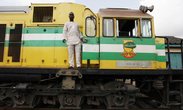 Associated Press photographer Sunday Alamba has filed a cracking set shot last month documenting the recently re-opened train lines through Nigeria following the $166 million project to rebuild portions of the abandoned line washed out years earlier. The state-owned China Civil Engineering Construction Corp. rebuilt the southern portion of the line, while a Nigerian company handled the rest. The rebirth of the lines constitutes a major economic relief to the poor who want to travel in a country where most earn less than $1 a day. Airline tickets remain out of the reach of many and journeys over the nation's crumbling road network can be dangerous. The cheapest train ticket available costs only $13. Here a train driver stands on an Ooni of Ife train to Kano, in Lagos.