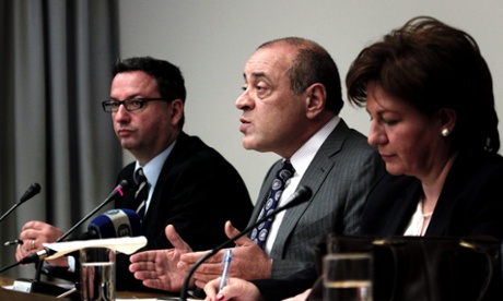 Chairman of the Hellenic Federation of Enterprises Dimitris Daskalopoulos (centre) discusses the Cypriot crisis at a news conference today. Photograph: EPA/Alkis Konstantinidis
