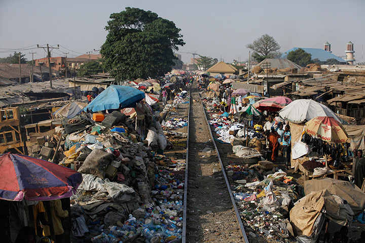 FTA: Sunday Alamba: The Lagos to Kano rail track passes through a market in Kaduna
