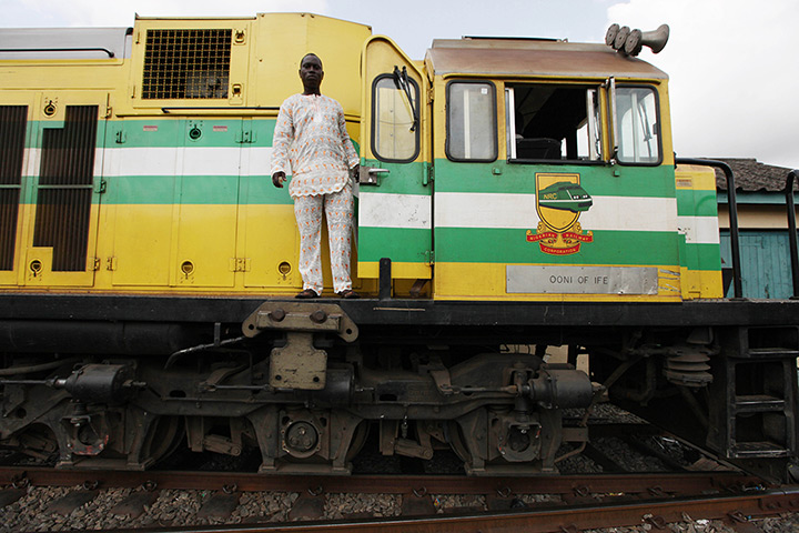 Sunday Alamba: A train driver stand on an Ooni of Ife train to Kano, in Lagos, Nigeria