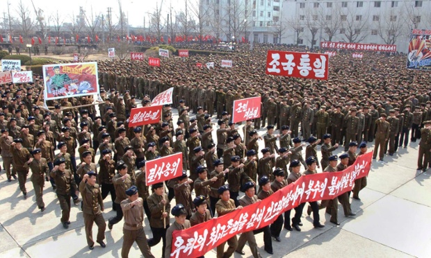 This may have been photoshopped! In this picture released by the North's official KCNA news agency in Pyongyang, North Koreans attend a rally held to demonstrate their readiness for a possible war against the United States and South Korea in Nampo, North Korea.