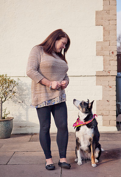 Action on Stroke month: Christine standing with her dog