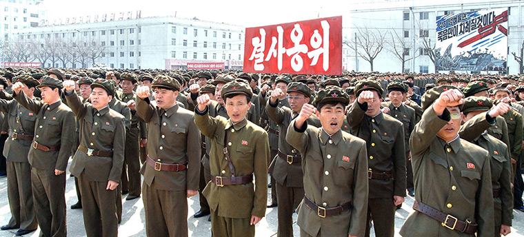 Korea tensions: North Koreans attend a rally