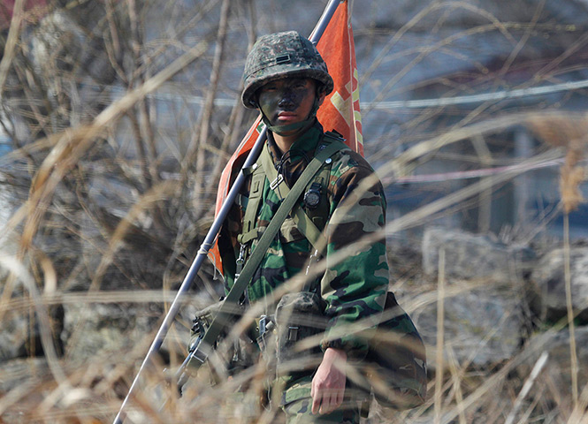 Korea tensions: A soldier from a South Korean artillery unit during military training