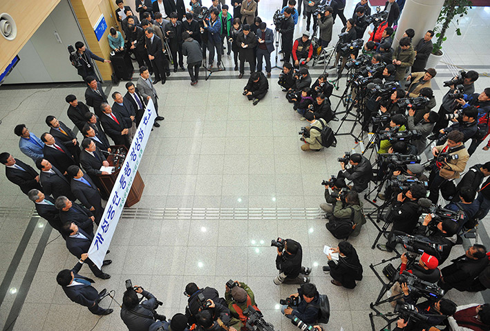 Korea tensions: Han Jae-Kwon (C left), head of the assoc