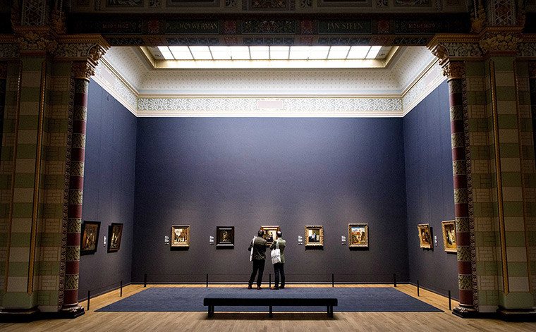 Rijksmuseum: Visitors look at paintings during the press-viewing day