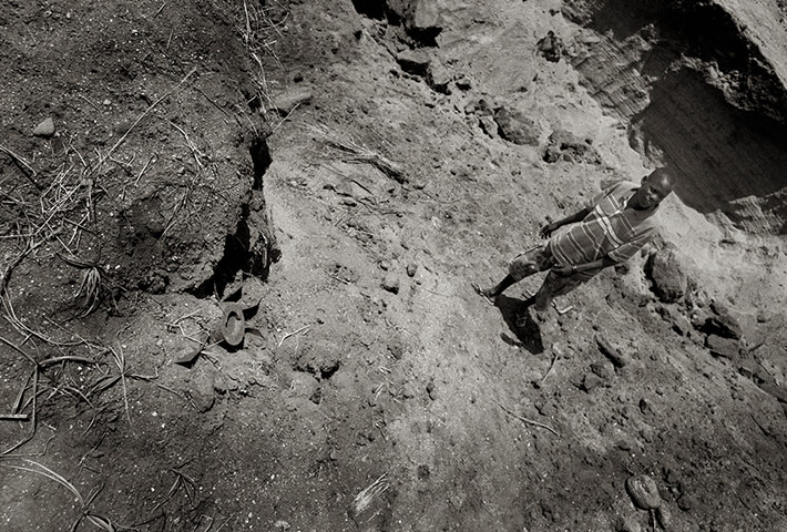 Villager points unexploded bomb