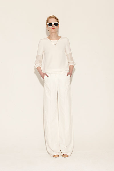 All Ages: white top white wide legged trousers sunglasses