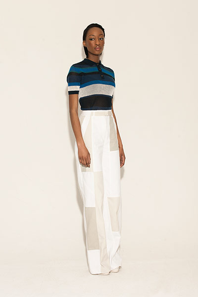 All Ages: blue black white top white wide legged trousers