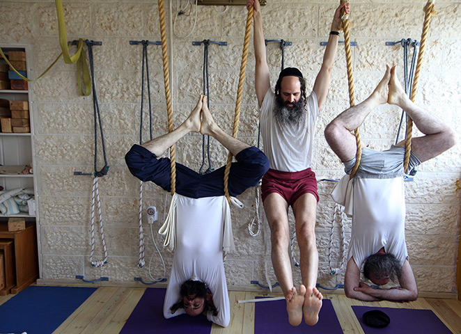 24 hours in pictures: Ultra Orthodox Jews practice yoga