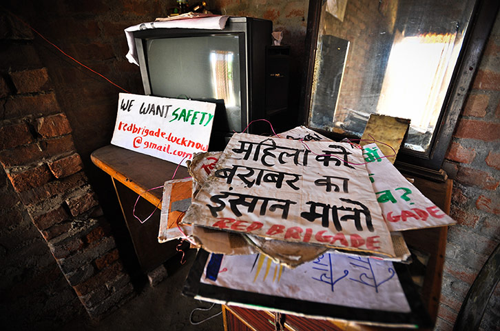 Signs and posters in the home the leader of thre Red Brigade