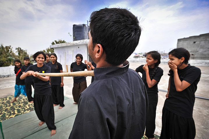 Pooja Vishwakarma, 18, a captain in the Red Brigade