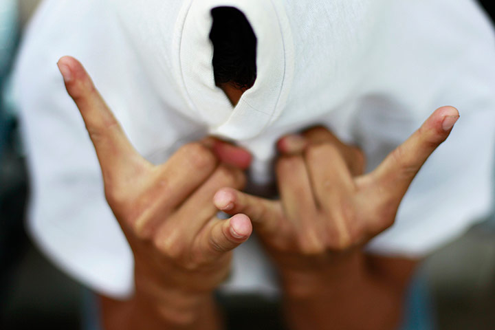 24 Hours: A member of the Mara MS 13 gang at a park in San Vicente, El Salvador