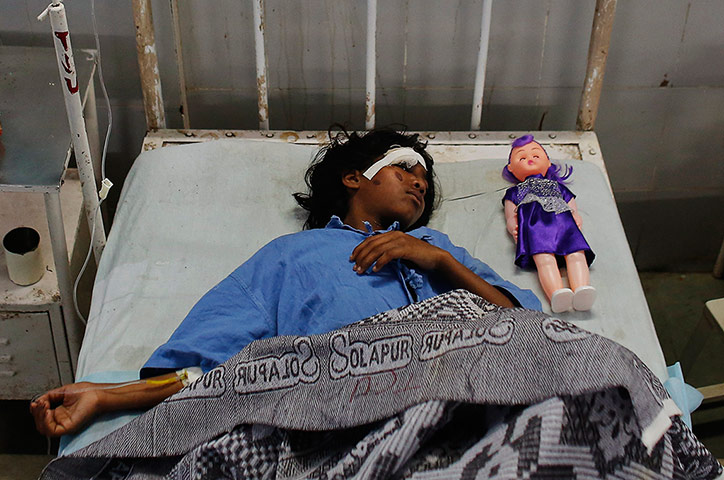 24 Hours: A girl injured during the collapse of a building in Mumbai, India