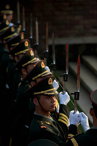 24 Hours: An honour guard prepares for the arrival of Myanmar's President Thein Sein