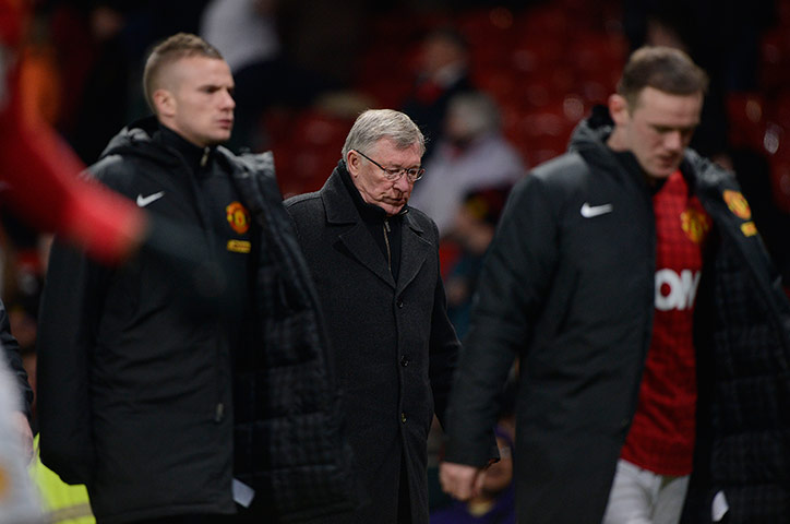 The Manchester derby: A dejected Alex Ferguson walks off