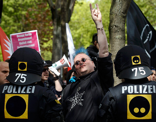 May Day: German riot police officers watch the crowd in Berlin